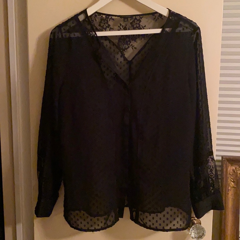 Super chic sheer black blouse.